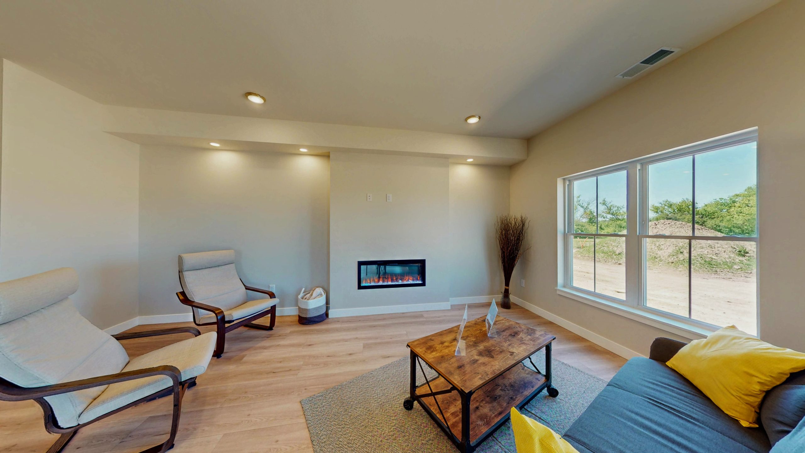 Jefferson Hills condo living room — open concept with fireplace